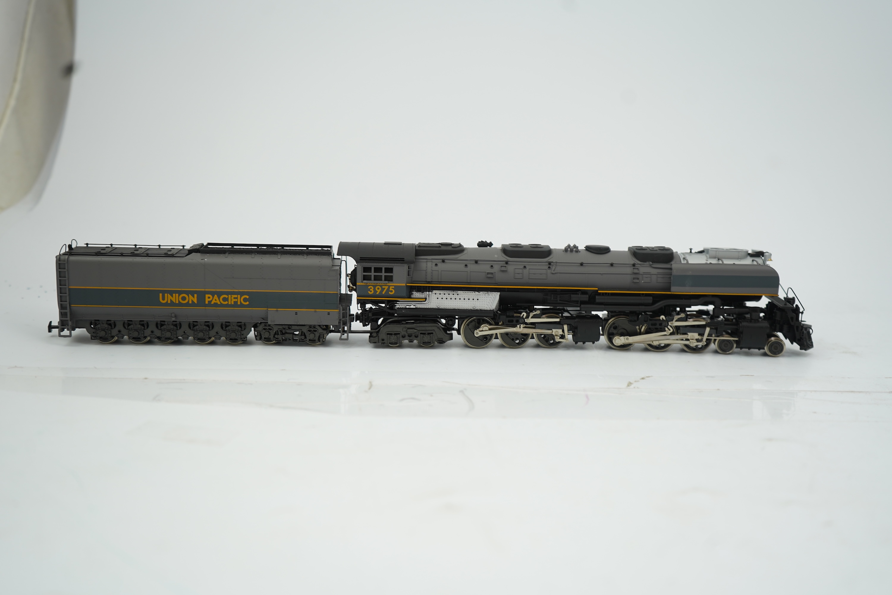 Two HO gauge Rovarossi Union Pacific locomotives; 3975, 4-6-6-4 tender locomotive, together with 836, 4-8-4 tender locomotive, both powered for two rail operation.